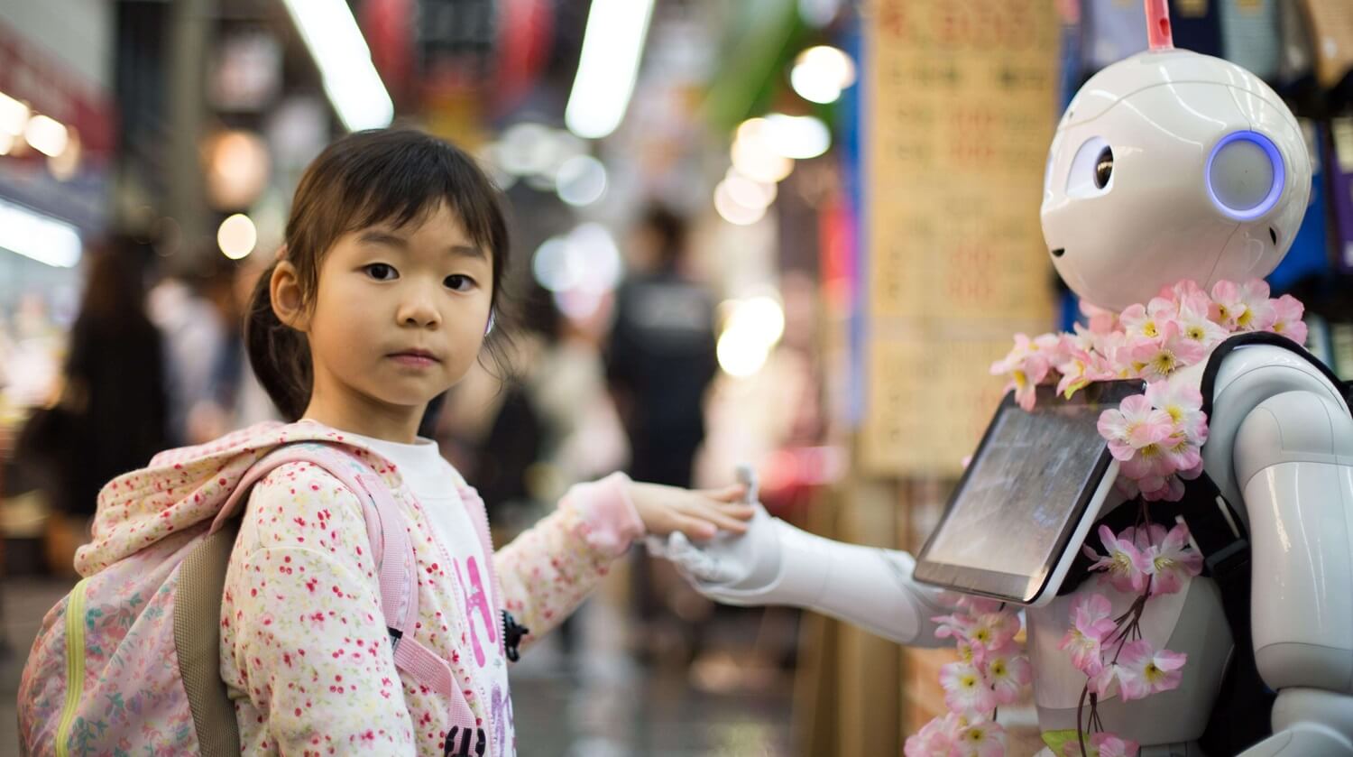 A girl interacting with robot