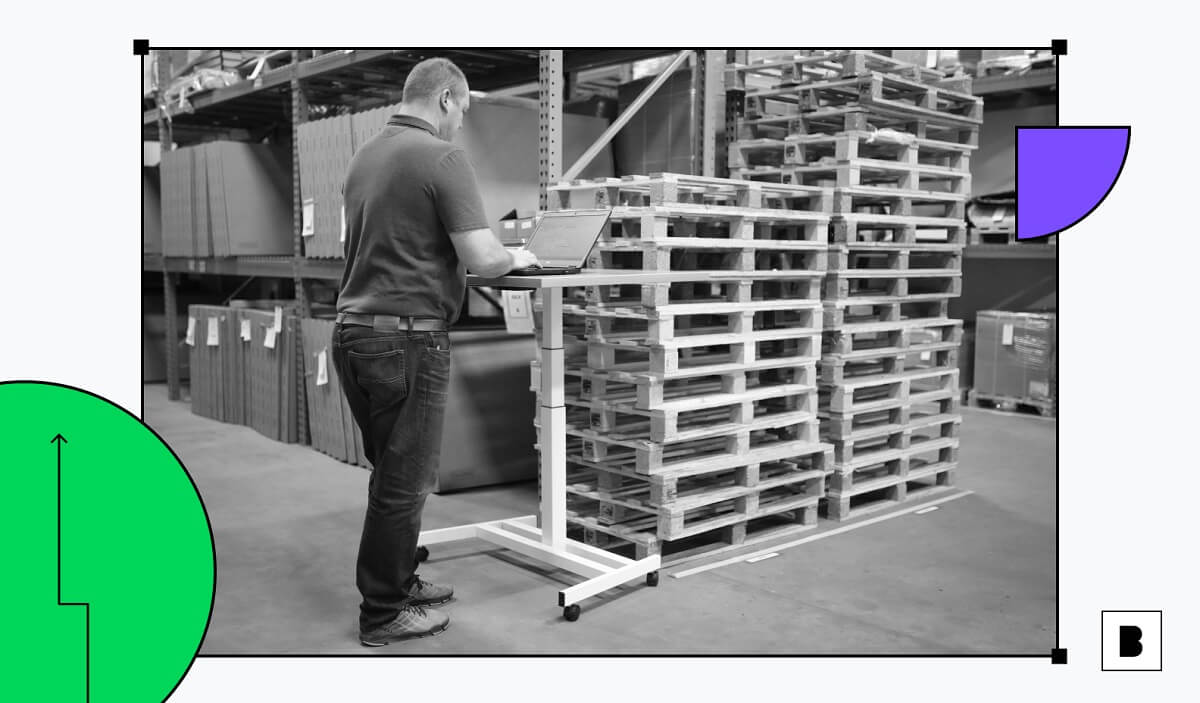 A man working in warehouse/backroom of a retail store