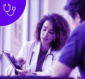 A female doctor consulting her patient