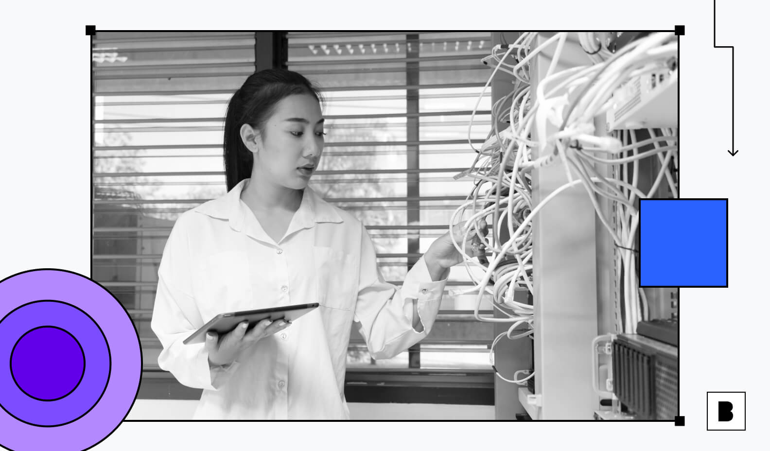 A female IT engineer monitoring servers in server room