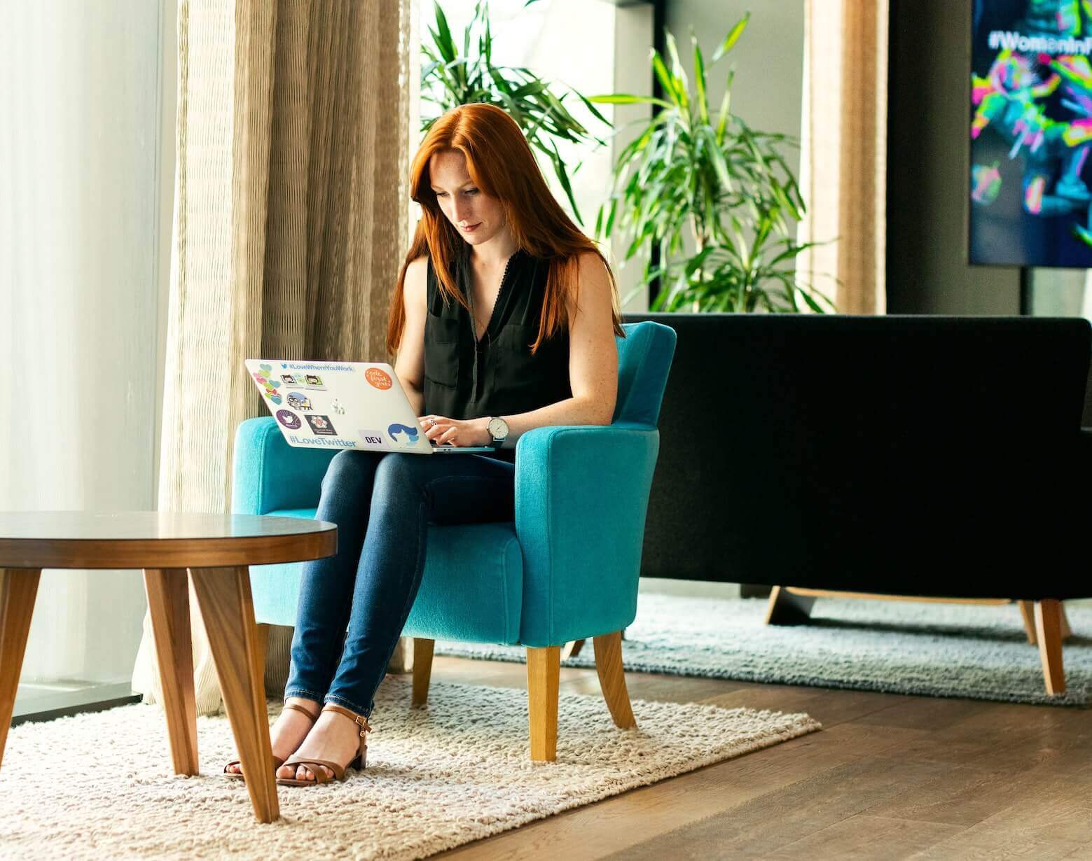 Woman in blackblue sofa